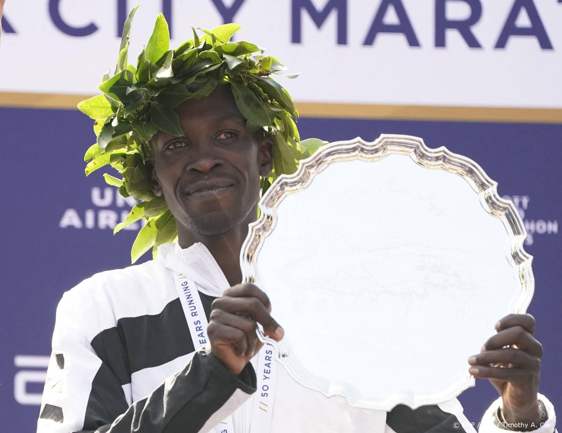 Men's division winner Albert Korir Kenya poses on the podium after the 2021 TCS New York City Marathon in New York on November 7, 2021. After a forced break in 2020, the New York City Marathon is back on for its 50th edition, and with it the countless opportunities to run it for charity, an industry that has become a staple, and hopes to take off again after the pandemic.
TIMOTHY A. CLARY / AFP