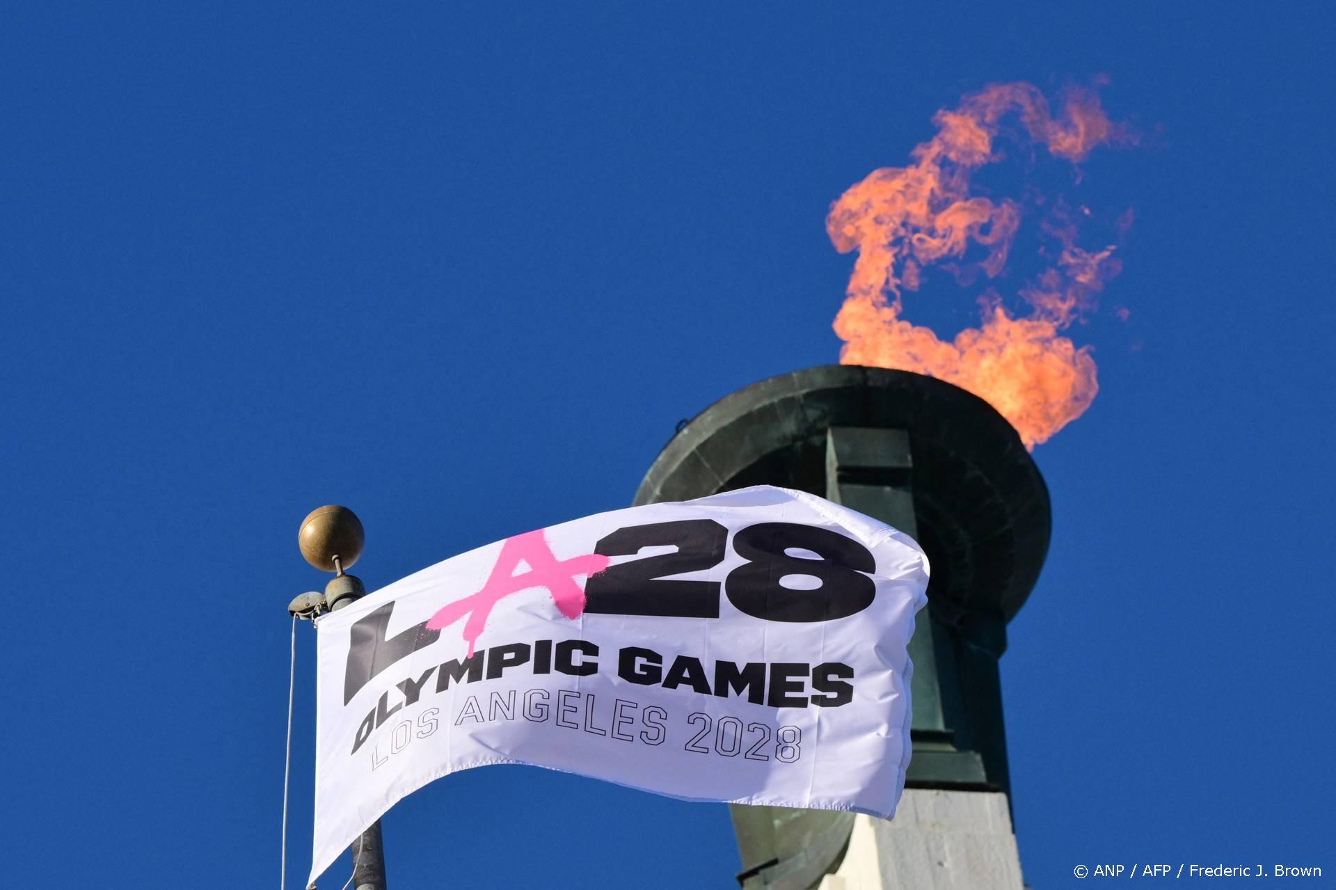 The LA28 Olympic cauldron is lit during a ceremonial lighting at the Memorial Coliseum in Los Angeles on January 13, 2026, ahead of the launch of ticket registration for the 2028 Summer Olympic Games. 
Frederic J. Brown / AFP