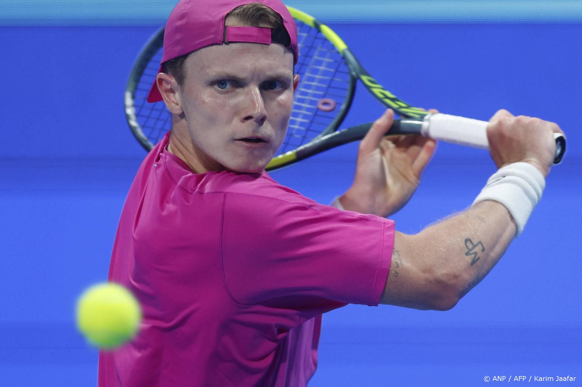 Netherlands’ Jesper De Jong hits a return against Russia's Andrey Rublev during their men’s singles match at the Qatar Open tennis tournament in Doha on February 17, 2026. 
Karim JAAFAR / AFP