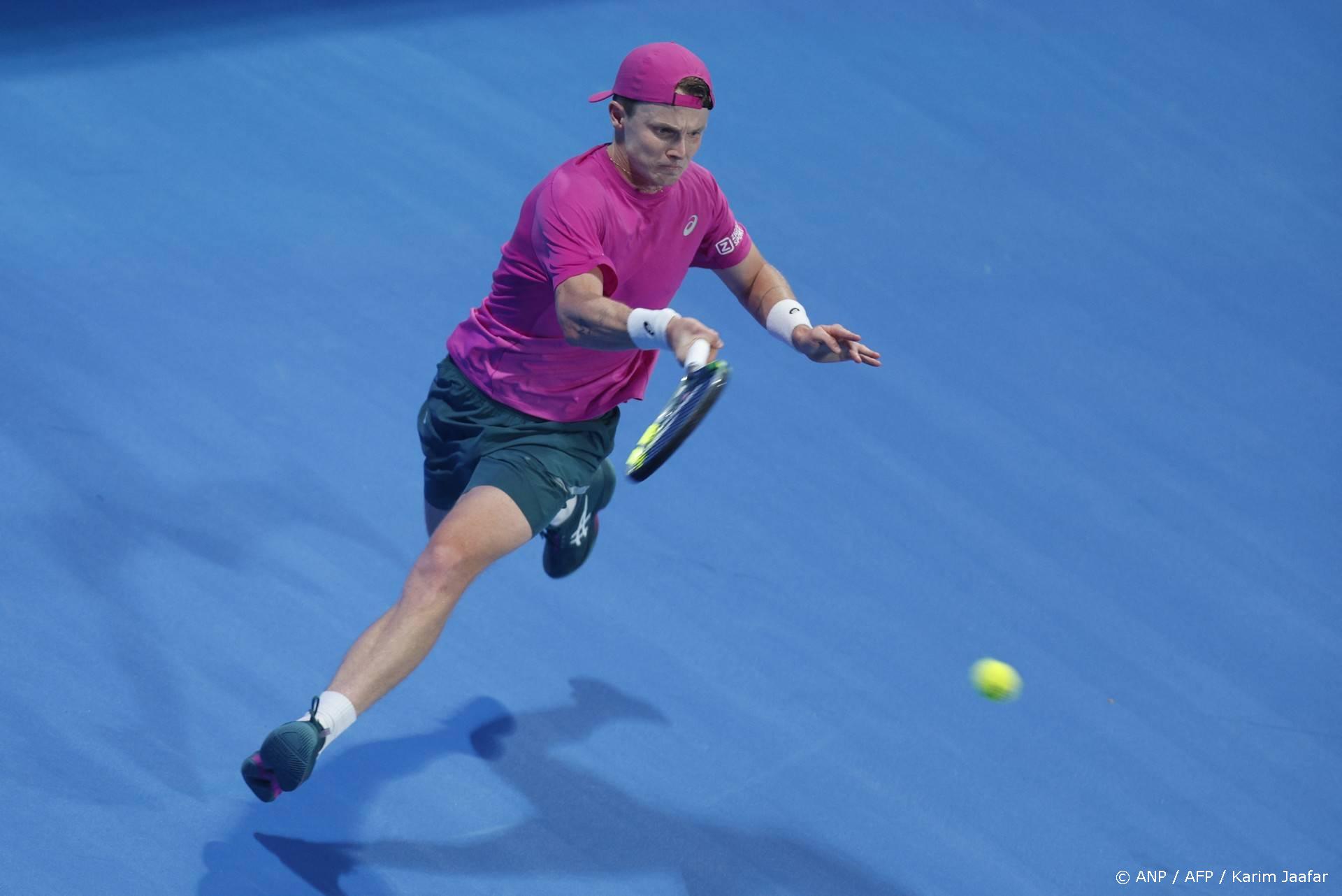 Netherlands’ Jesper De Jong hits a return against Russia's Andrey Rublev during their men’s singles match at the Qatar Open tennis tournament in Doha on February 17, 2026. 
Karim JAAFAR / AFP