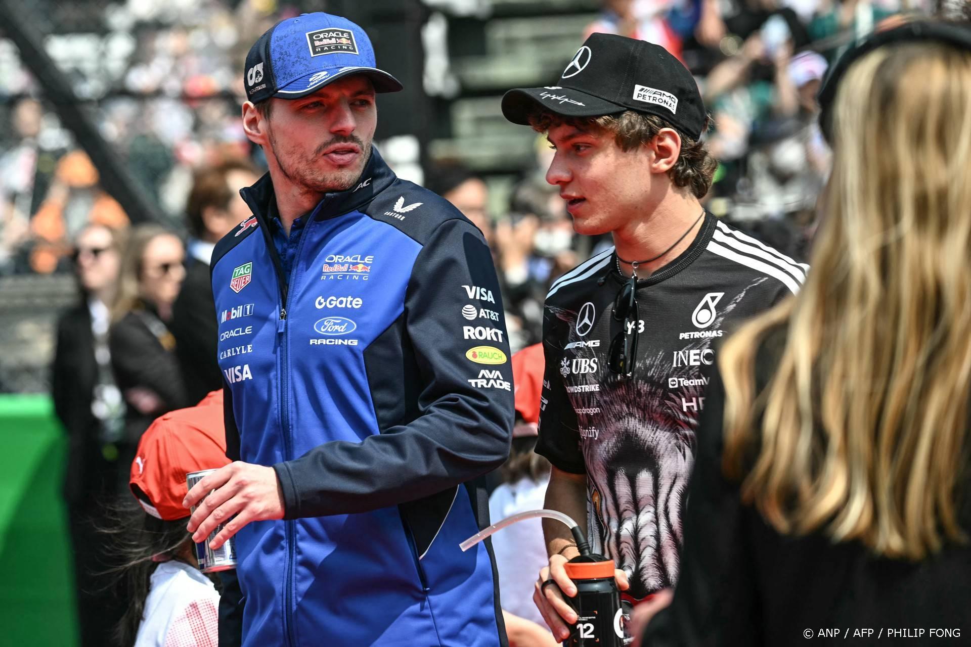 Red Bull Racing's Dutch driver Max Verstappen and Mercedes' Italian driver Kimi Antonelli arrive for the drivers' parade before the Formula One Japanese Grand Prix at the Suzuka circuit in Suzuka, Mie prefecture on March 29, 2026. 
Philip FONG / AFP